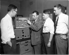 Left to Right- Bill Jones, Dr. John Costas, Roger Swanson, Jack Cunnif